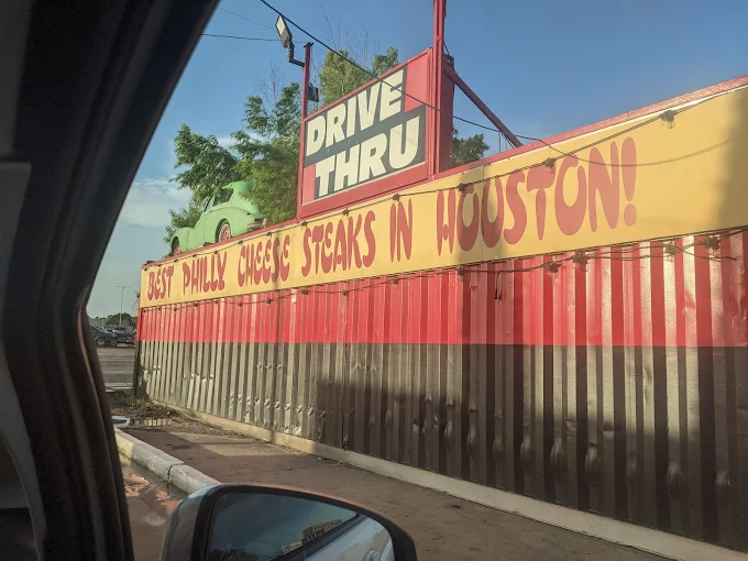 "Best Philly Cheese Steaks in Houston!" sign